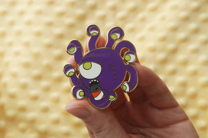 Beholder Enamel Pin